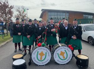 Pipe band outside IWHC for the Manchester St Patrick’s Day Parade 2023 - will they be out for the Manchester St Patrick’s Day Parade 2024?